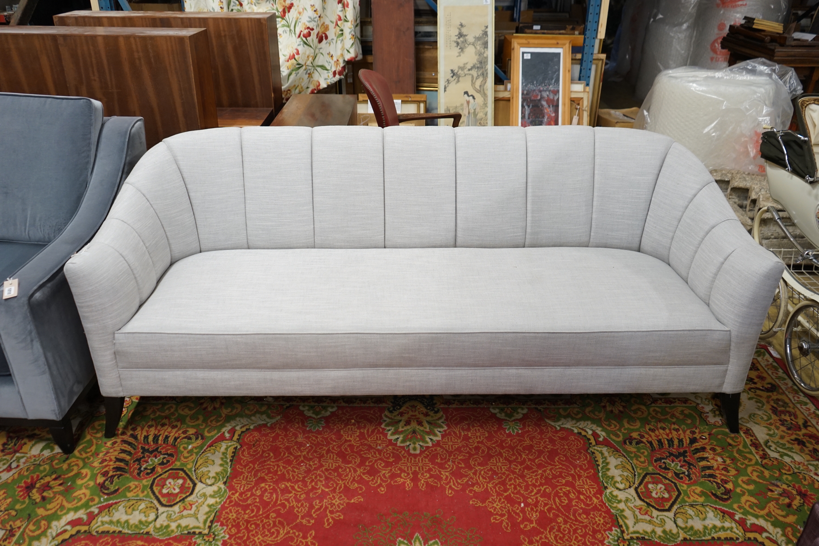 A Bray Design channel back settee in Sahco flint fabric, width 210cm, depth 84cm, height 83cm